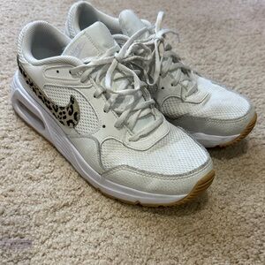 Nike Women’s White Athletic Sneakers with Leopard-Print Swoosh